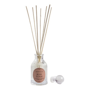 diffuseur de parfum rose élixir flacon transparent avec bâtonnets en bois parfumé - bouquet parfumé mathilde m